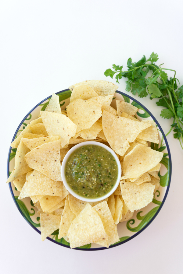 This Tomatillo Salsa is such a tasty alternative to traditional salsa.  It's a little sweet and a little spicy and absolutely perfect. It's great by itself with just some chips, but it would be great as a green enchilada sauce as well.