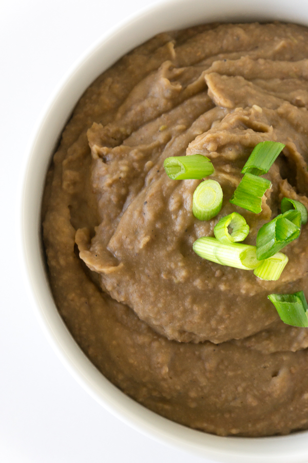 bowl of healthy vegetarian unfried pinto beans