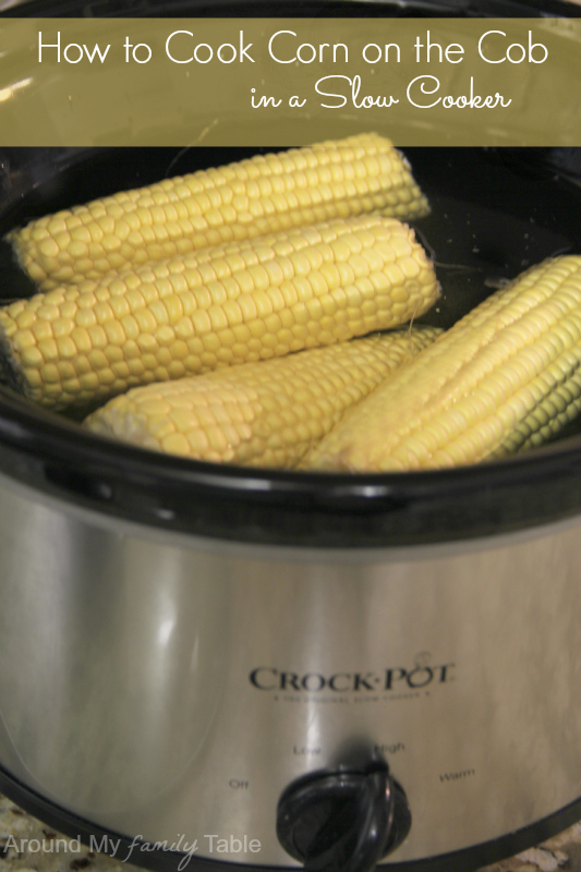 ears of corn on the cob in a slow cooker