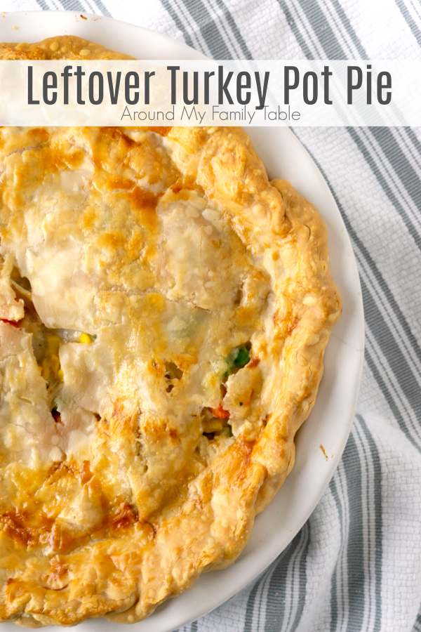 One of the best ways to use up holiday leftover turkey is with an easy Leftover Turkey Pot Pie. Mixed vegetables, leftover turkey, and a creamy sauce mixed together and topped with a flaky pie crust turn leftover turkey into a delicious dinner. #leftoverturkey #christmastleftovers #thanksgivingleftovers #potpie #turkey via @slingmama