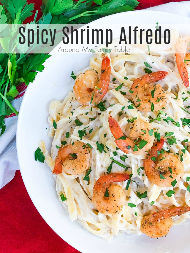 The addition of spicy shrimp to fettuccine alfredo turns basic alfredo into a hearty meal.  Spicy Shrimp Alfredo is a great weeknight family meal. #fettuccinealfredo #spicyshrimp #grilledshrimp #shrimpalfredo via @slingmama