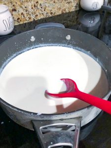 fettuccine alfredo sauce in a pan