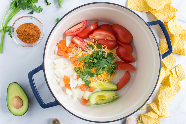 diced vegetables in stock pot to make gluten free soup