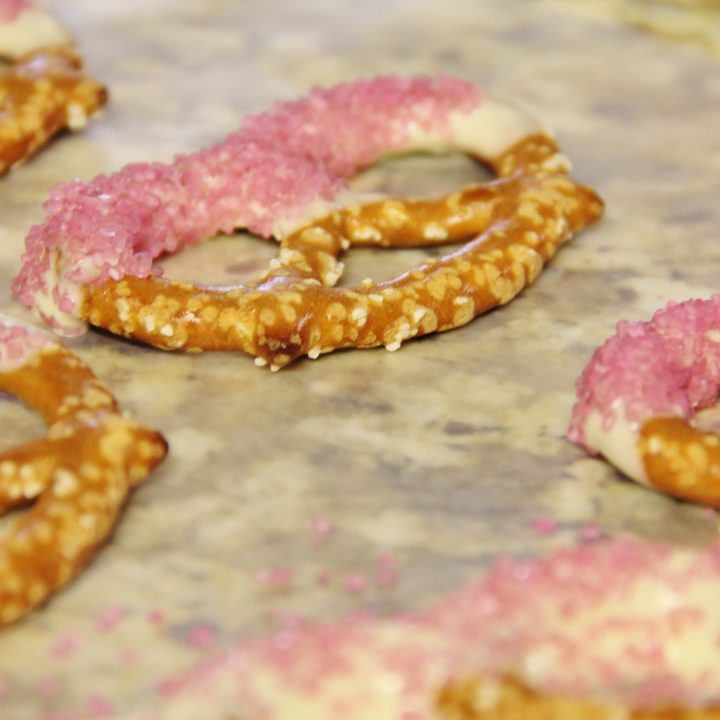 White Chocolate Dipped Pretzels with Valentine's Day sprinkles