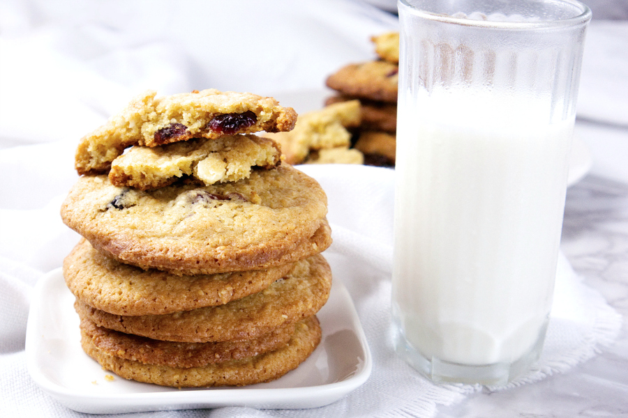 Tart and sweet, these Cranberry White Chocolate Cookies are festive and perfect for the holidays.  Everyone loves the tart dried cranberries in these crispy cookies.