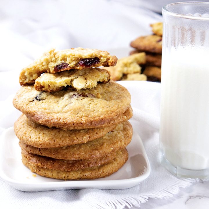 Tart and sweet, these Cranberry White Chocolate Cookies are festive and perfect for the holidays.  Everyone loves the tart dried cranberries in these crispy cookies.