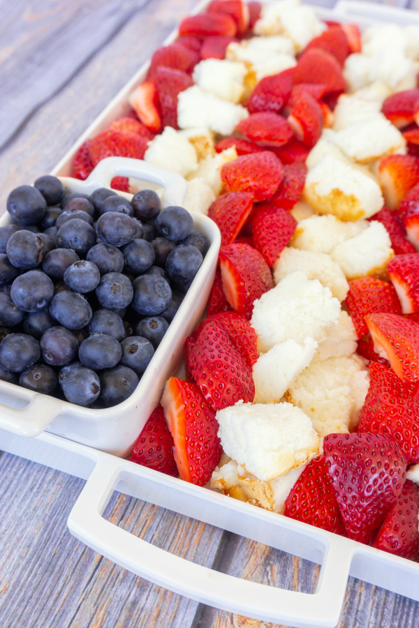 Take advantage of summer berries for this 4th of July Fruit Platter that is the perfect dessert for a hot summer night.  It's simple to throw together, looks festive, and is not very heavy. It's also a great make ahead dessert too!