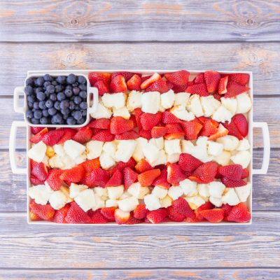 Take advantage of summer berries for this 4th of July Fruit Platter that is the perfect dessert for a hot summer night.  It's simple to throw together, looks festive, and is not very heavy. It's also a great make ahead dessert too!