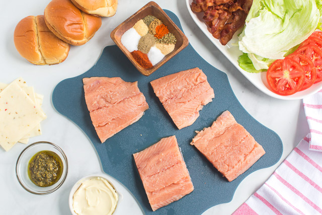 raw, wild-caught salmon fillets and blackening spices