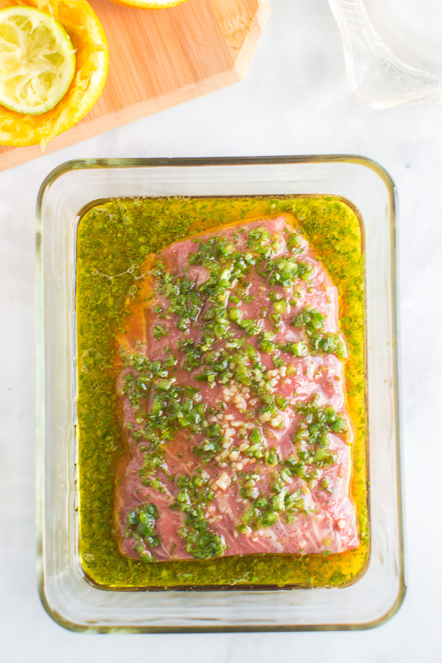 flank steak marinating in Mexican seasonings