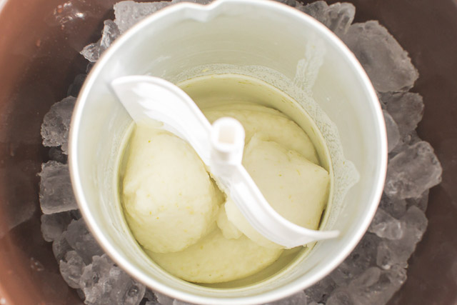 churning lime sherbet in ice cream maker