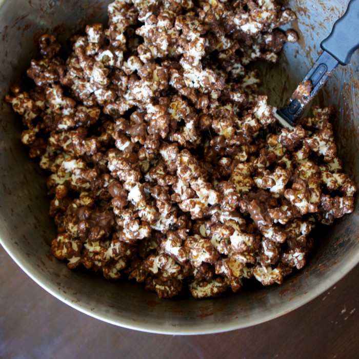 Who doesn't love Muddy Buddies?! It's the combination of creamy peanut butter and melty chocolate drizzled all over Chex cereal, then coated with a nice helping of powdered sugar. This Muddy Buddy Popcorn might even be better than the original. 