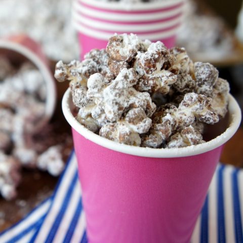 muddy buddies popcorn in pink cup