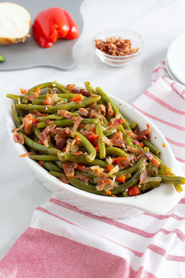 copycat version of Famous Dave's green beans in a white serving dish