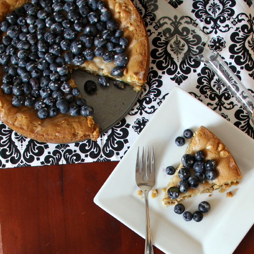 Biscoff Stuffed White Chocolate Chip Cookie Tart with Fresh Berries