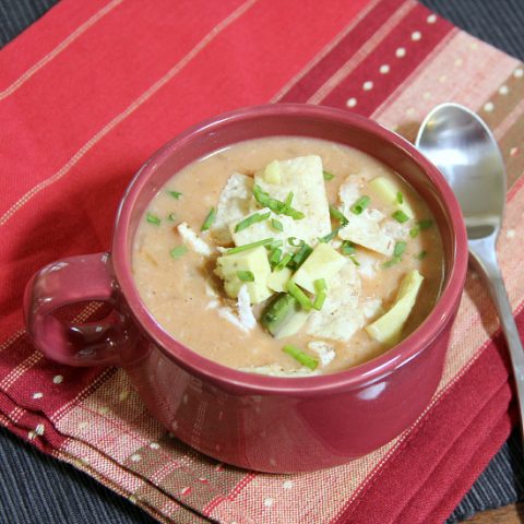 one serving of white chicken chili in red soup mug