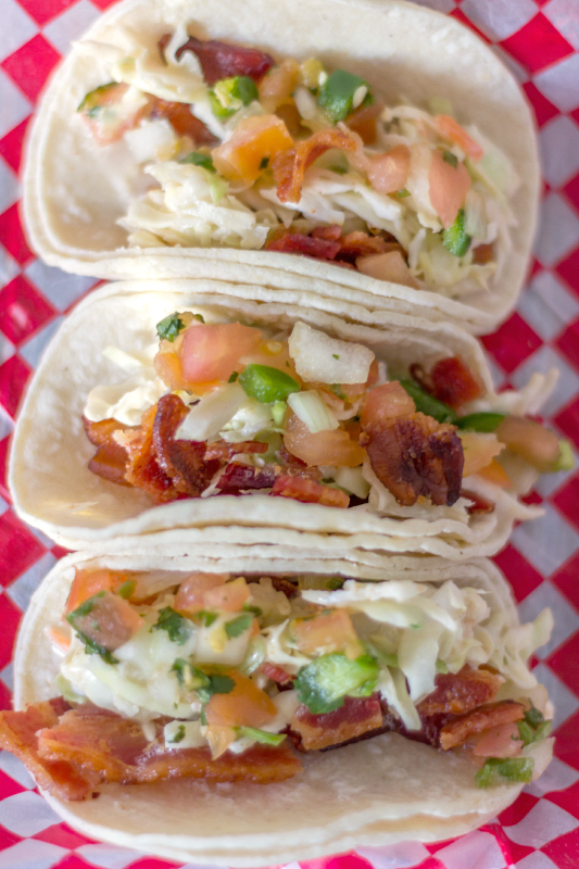 Everything you love about tacos, only better because they are filled with bacon!  Try these BACON TACOS for the next Taco Tuesday. #tacos #bacon #tacotuesday via @slingmama