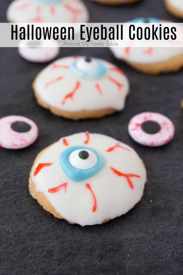 How cool are these creepy Halloween Eyeball Cookies? These creepy eye cookies are super easy to make because you just start off with vanilla wafers and white chocolate. A little icing and decoration and they are ready for your little trick-or-treaters to enjoy. #halloweencookies #halloweenrecipes #easyhalloween via @slingmama