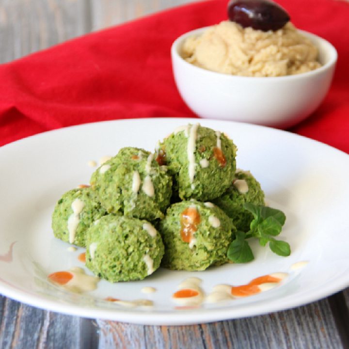 Pea-Afel (Vegan Falafel) on a white plate with hummus