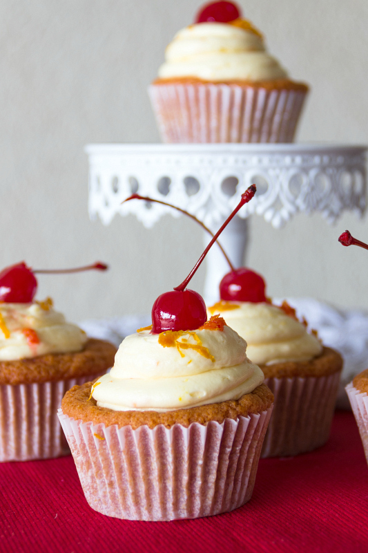 Tequila Sunrise Cupcakes-- a grenedine cupcake with tequila orange buttercream