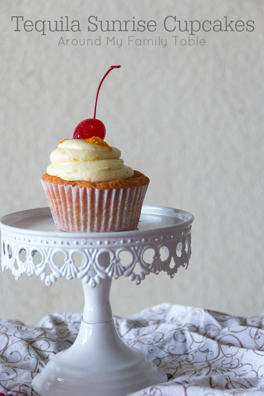 Tequila Sunrise Cupcakes-- a grenadine cupcake with tequila orange buttercream