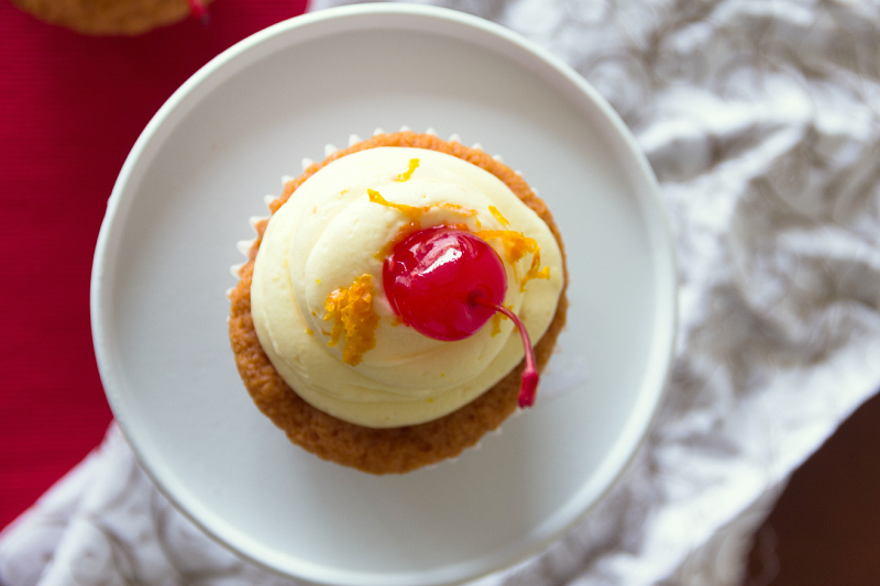 Tequila Sunrise Cupcakes-- a grenedine cupcake with tequila orange buttercream