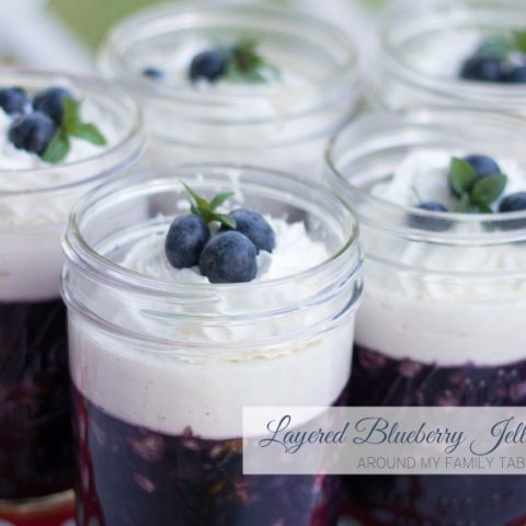 layered blueberry jello salad in mason jars