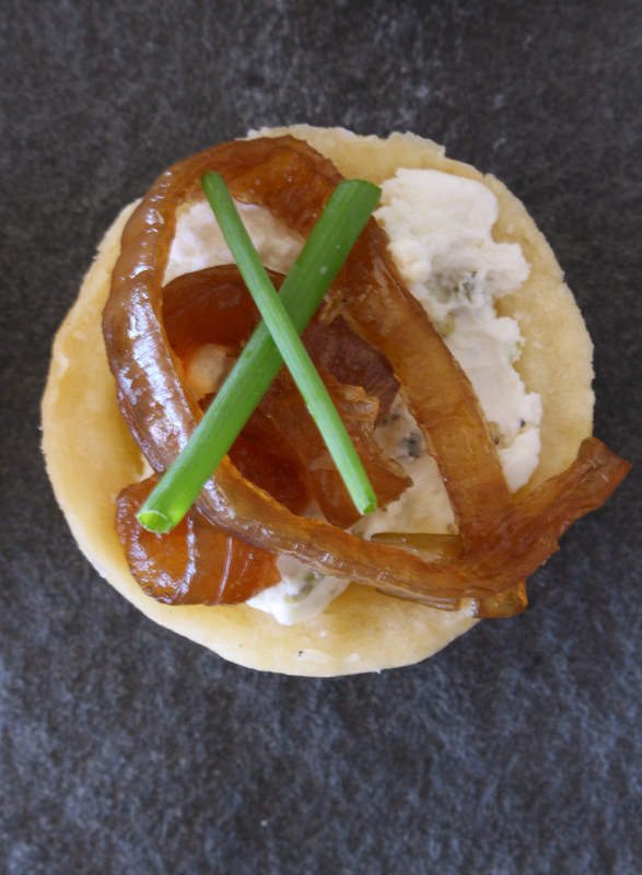 Sweet Onion & Goat Cheese Tarts are easy and delicious.  They make a perfect appetizer.