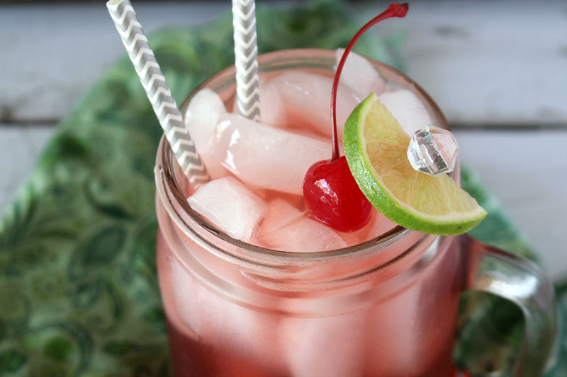 Turn your favorite summertime drink into something for grown ups only!  Love this  Boozy Cherry Limeade Recipe.