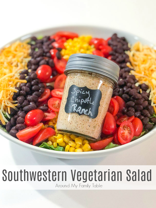 This simple Southwestern Vegetarian Salad has a ton of flavor from beans and corn, but the spicy chipotle ranch really takes it up a notch. via @slingmama