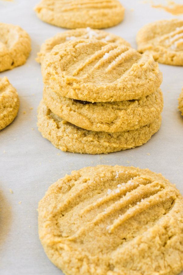 stacks of golden brown flourless peanut butter cookies