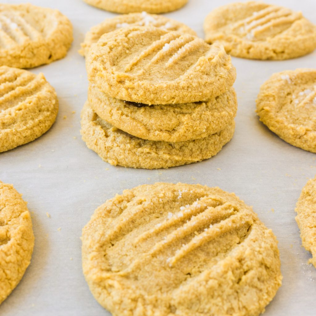 stacks of gf peanut butter cookies on counter top