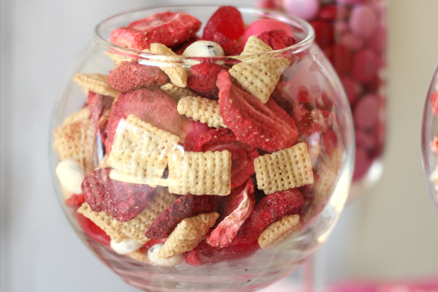 Skip the high calorie Valentine treats and sub in this delicious and Healthy Valentine's Snack Mix to make everyone happy.