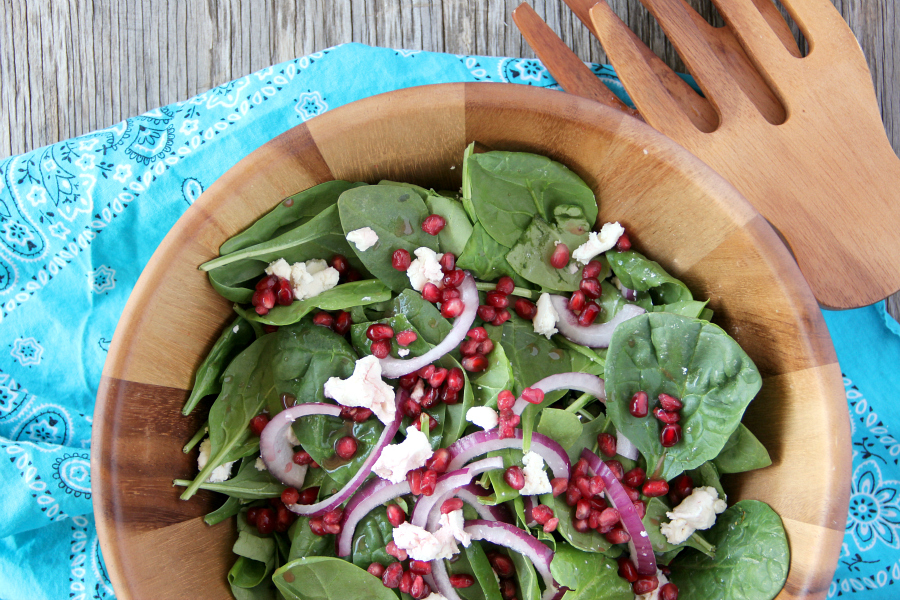 Lighten up with a bowl of POMEGRANATE AND GOAT CHEESE SALAD with an easy and delicious homemade Pomegranate Vinaigrette!