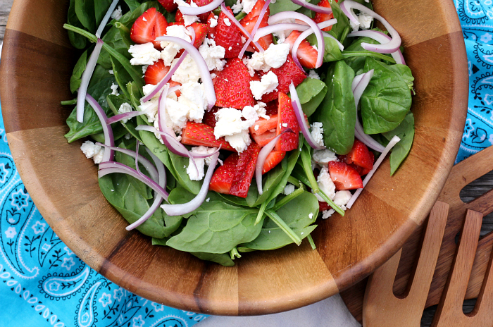 Lighten up with a big bowl of STRAWBERRY & GOAT CHEESE SPINACH SALAD with an easy and delicious homemade Strawberry Vinaigrette!