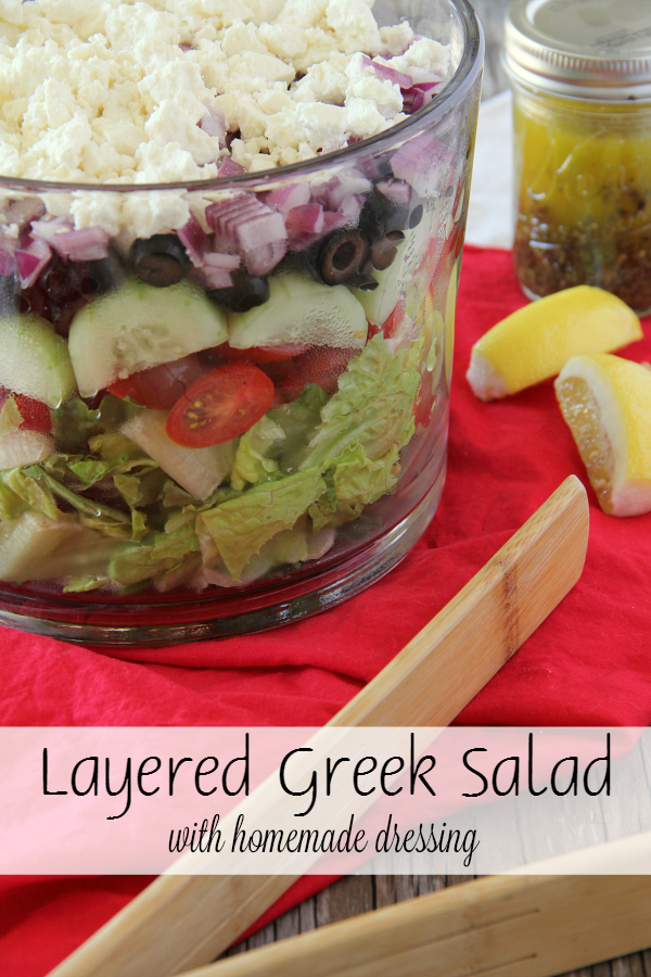 Serve this Layered Greek Salad for supper this week and it will be devoured in no time! Everyone loves how beautiful it is!