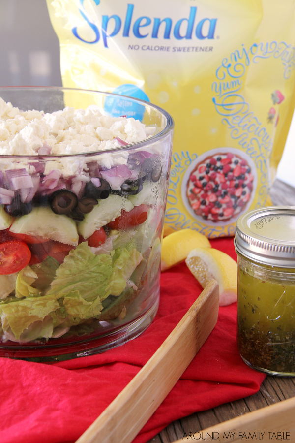 Serve this Layered Greek Salad for supper this week and it will be devoured in no time! Everyone loves how beautiful it is!