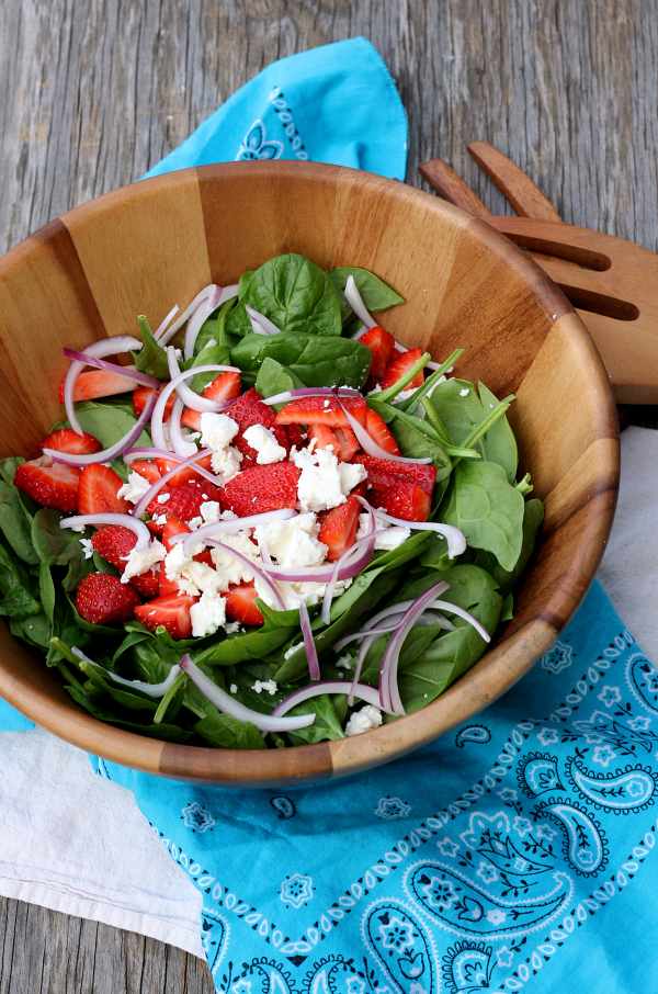 Lighten up with a big bowl of STRAWBERRY & GOAT CHEESE SPINACH SALAD with an easy and delicious homemade Strawberry Vinaigrette!