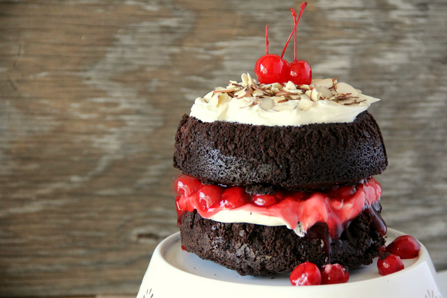 You will never make a plain box of brownies again once you make this stunning BLACK FOREST BROWNIE CAKE with the flavors and look of a traditional Black Forest Cake, but with a decadent chocolate fudge brownie.