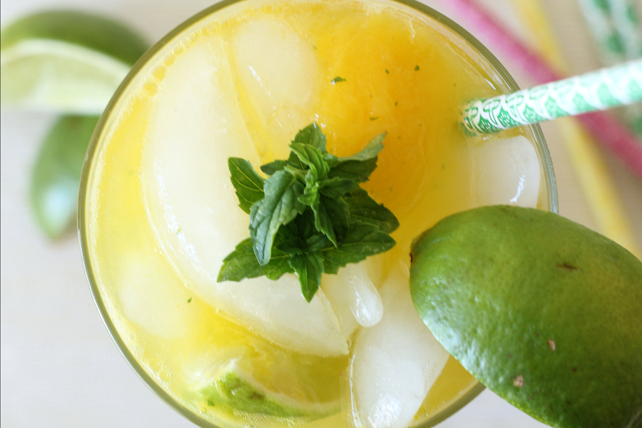 These Mango Mint Mojitos are a refreshing blend of mango, mint, lime, and rum.