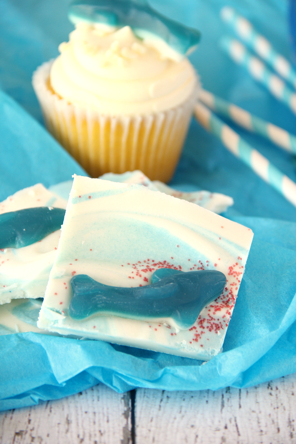 Satisfy your sweet tooth with this easy to make Shark Bark Candy. Be sure you make enough so you can handle the feeding frenzy during SHARK WEEK!