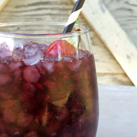 cherry wine cooler in a glass
