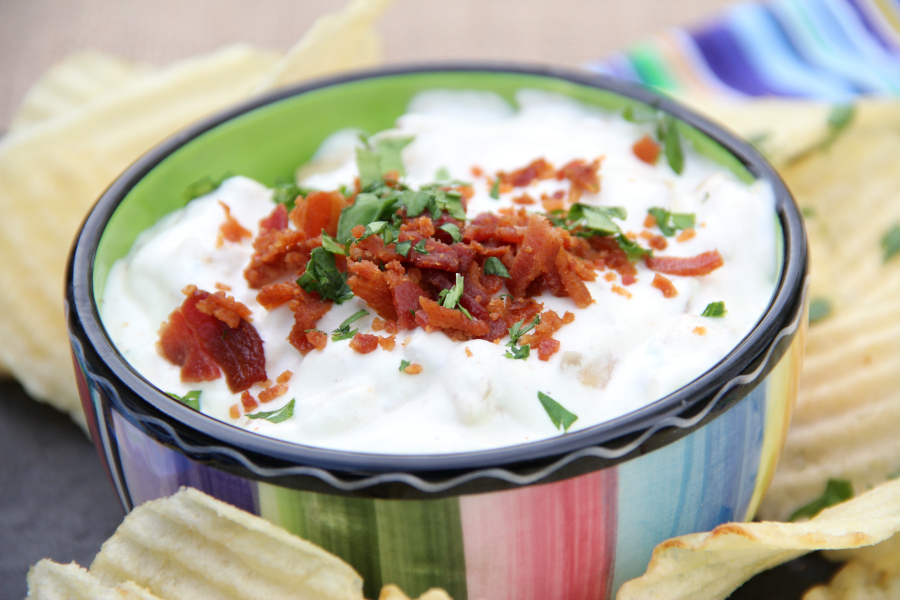 Take plain French Onion Dip from good to great when you add bacon. This French Onion & Bacon Dip will blow your mind.