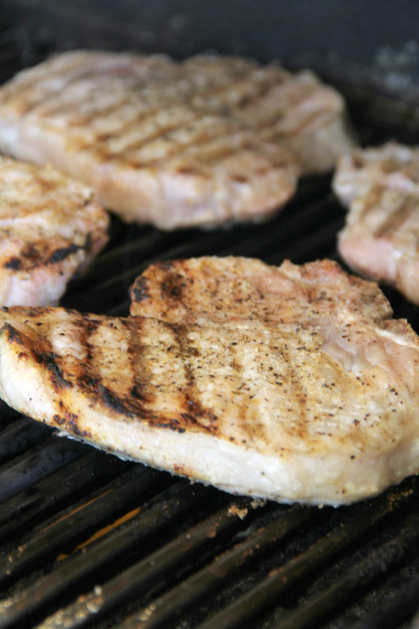 Pork Chops are great year round on the grill with just some simple seasonings, but making these Grilled Pork Chops with Cranberry Applesauce takes supper to a whole new level and turns it into a delicious holiday meal.