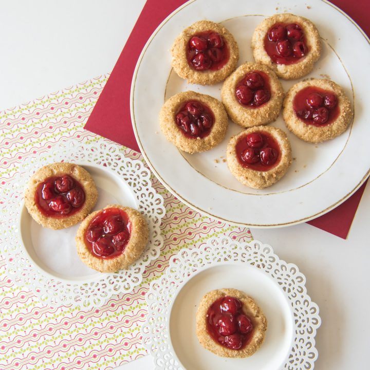 These delicious Cherry Cheesecake Cookies are a simple cookie twist on a classic Christmas dessert.