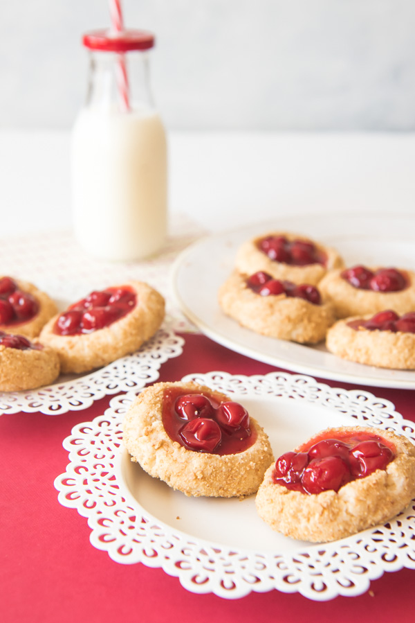 These delicious Cherry Cheesecake Cookies are a simple cookie twist on a classic Christmas dessert.