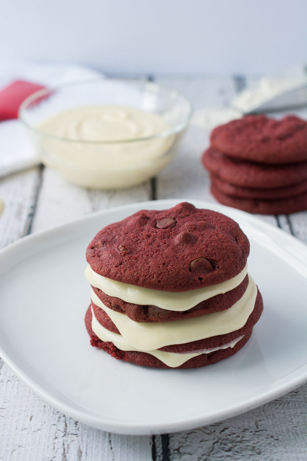 Santa is getting these Red Velvet Cookies with a decadent Cream Cheese Frosting this year instead of our traditional Chocolate Chip Cookies.