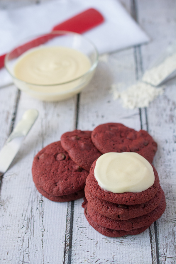 Santa is getting these Red Velvet Cookies with a decadent Cream Cheese Frosting this year instead of our traditional Chocolate Chip Cookies.