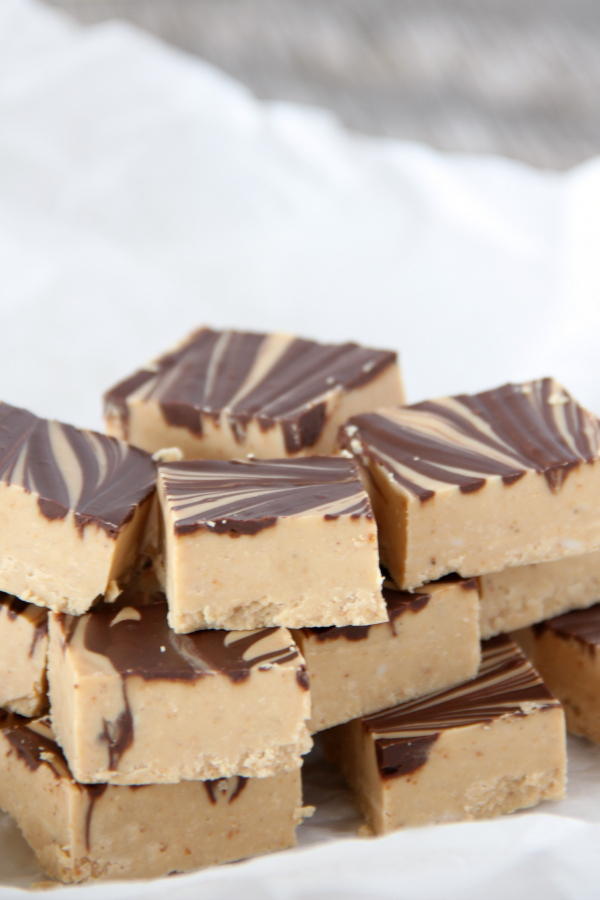 All you need is 3 ingredients to make this addictive Tiger Butter Fudge. It's the perfect blend of peanut butter and chocolate.