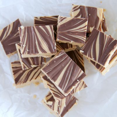 All you need are 3 ingredients to make this addictive Tiger Butter Fudge. It's the perfect blend of peanut butter and chocolate.